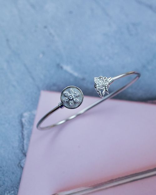 Rotating silver floral Kada